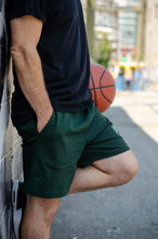 Load image into Gallery viewer, Forest Green athletic sweat shorts with pockets from King &amp; Country Grooming Products. Made in Canada.